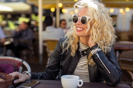 woman in sunglasses smiling